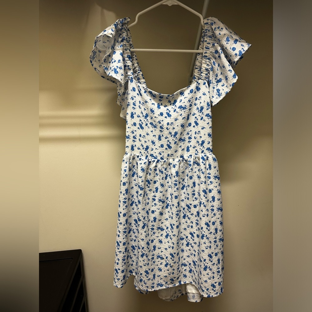 White and blue floral dress with ruffle sleeves
